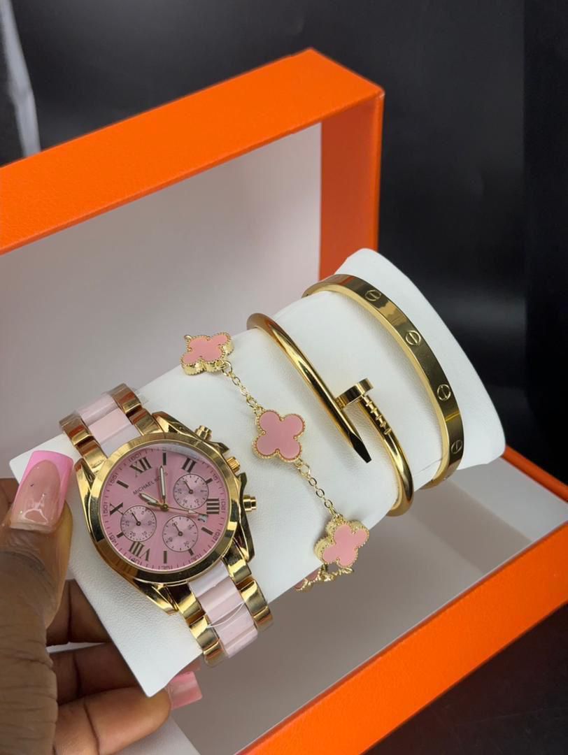 Gold watch and bracelet set presented in a gift box
